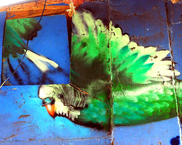 Parrot-Glamour mural by the Fly ID Crew on the southwest corner of Virgil and Monroe streets in Los Angeles