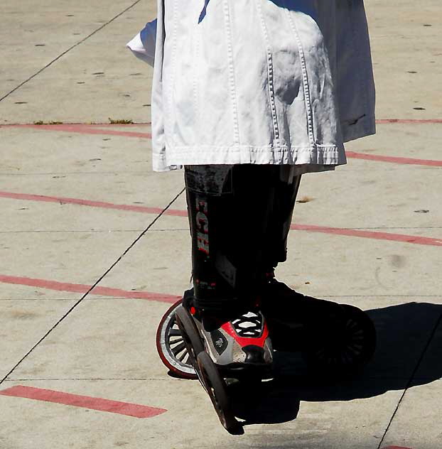 The man in a turban on roller-skates who scoots around playing his guitar right in your face in Venice Beach