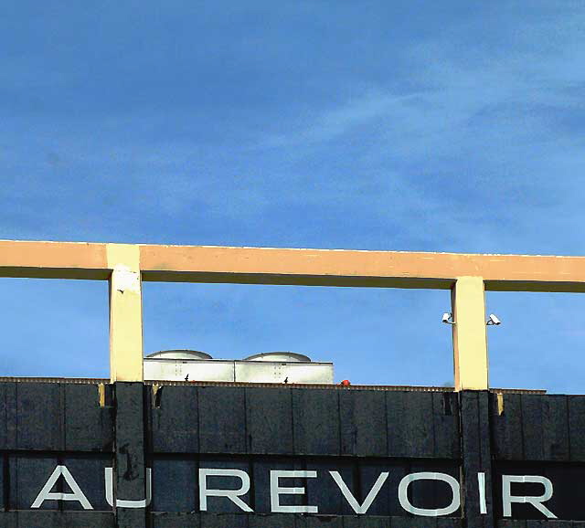 Au Revoir - Jaguar supergraphic, southeast corner of Hollywood Boulevard and La Brea