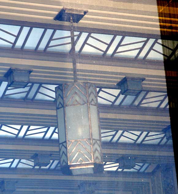 Security-First National Bank of Los Angeles branch at 5209 Wilshire Boulevard - listed on the National Register of Historic Places, built in 1929, the work of the architecture firm of Morgan, Walls and Clements - the last surviving example of Stiles O. Clements' black-and-gold terra cotta designs