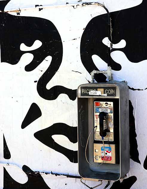 "Obey" face and pay phone, Sunset at Hyperion
