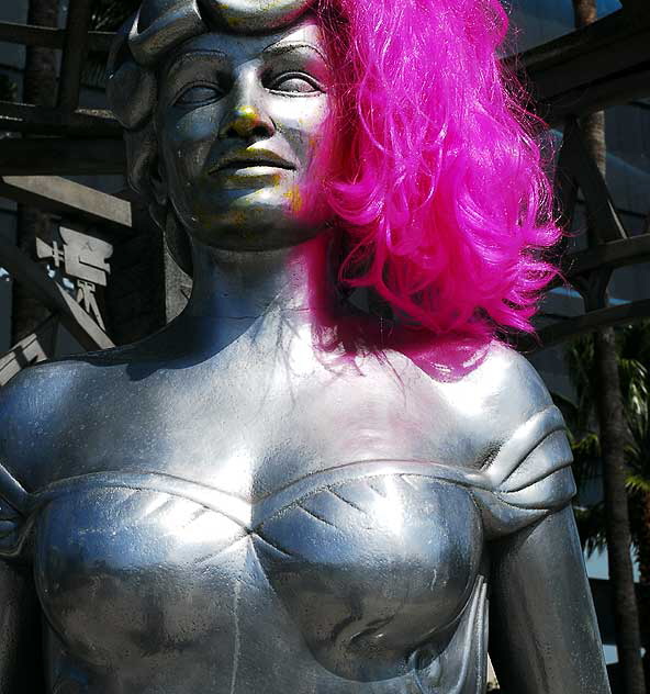 Mae West, with pink wig, Hollywood Gateway at Hollywood and La Brea
