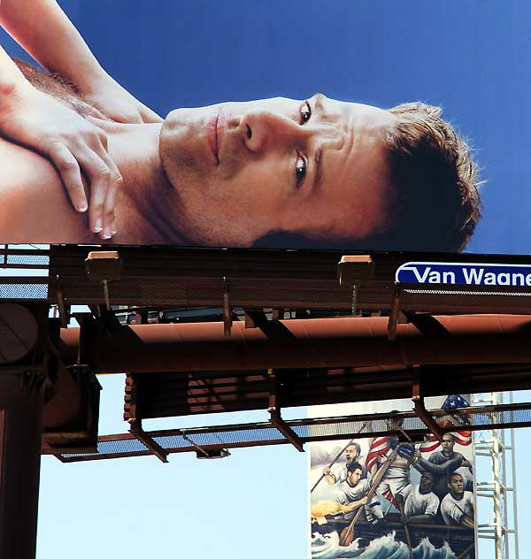 Billboard for the show "Hung" across the street from Hollywood High School