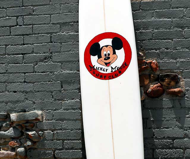 Mickey Mouse surfboard at "The Wall" at Surfrider Beach, Malibu