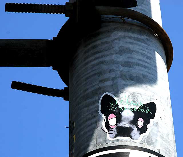 Dog sticker on lamppost, Melrose Avenue