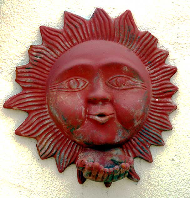 Wall Sun, back courtyard of the Crossroads of the World on Sunset Boulevard, Hollywood