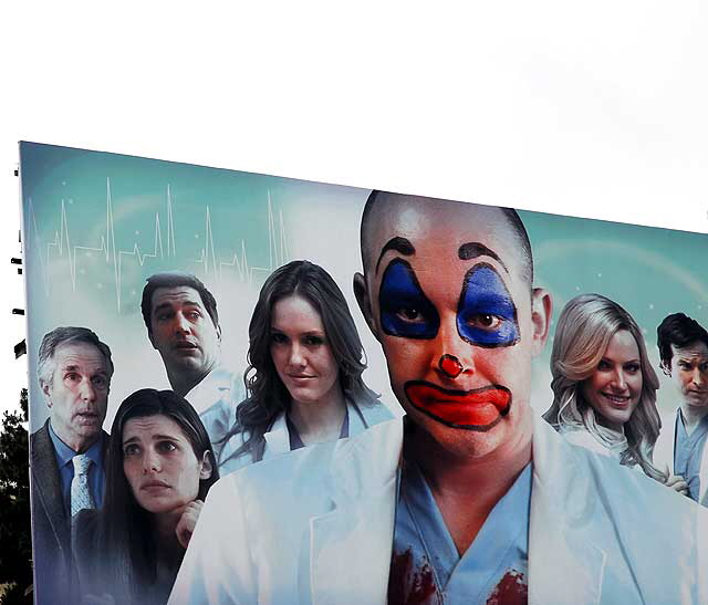 Clown billboard above the Sunset Strip, Tuesday, June 29, 2010