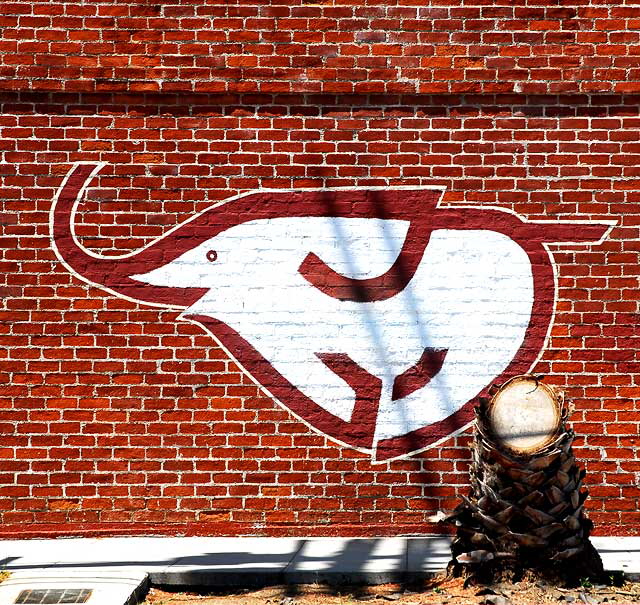 Anawalt Lumber logo and palm stump - North Highland and Romaine in Hollywood