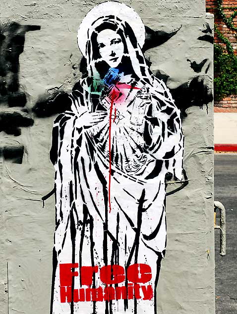 Free Humanity graphic on Melrose Avenue - Graffiti Madonna 