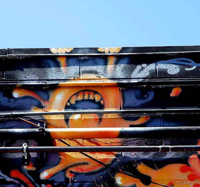Mural in alley behind Melrose Avenue: Orange Escape