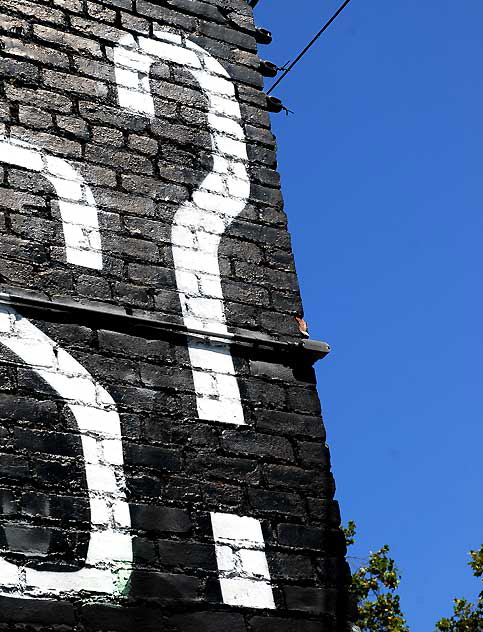 Mural in alley behind Melrose Avenue: Question Mark 