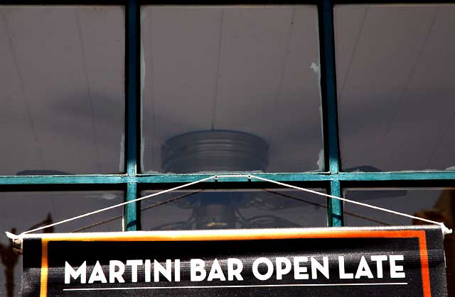 "Martini Bar Open Late" - sign at Musso and Frank on Hollywood Boulevard "Martini Bar Open Late" - sign at Musso and Frank on Hollywood Boulevard