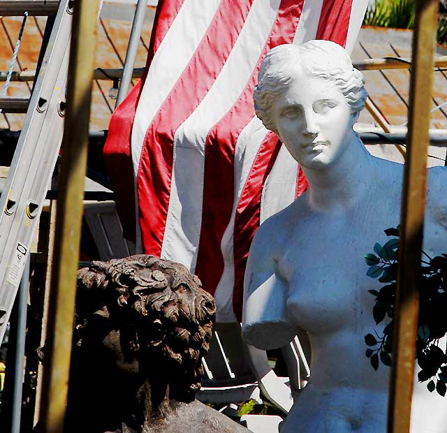 Flag and White Goddess - display yard at Nick Metropolis - La Brea and First, Los Angeles