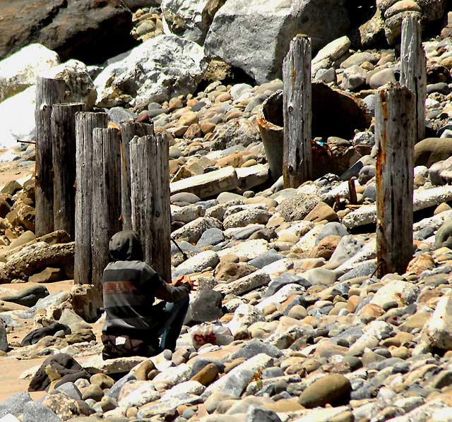 Homeless Man on Rocks, Pacific Coast Highway, Malibu