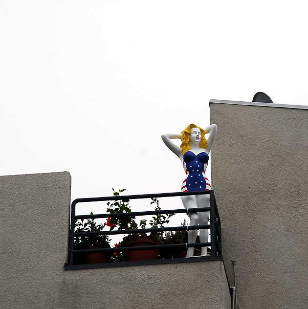 Fiberglass All-American Bathing Beauty figure above Speedway, Venice Beach