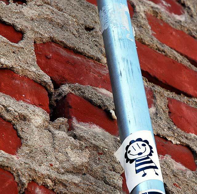 Bee-Girl Sticker and Brick Wall