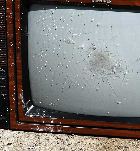 Upside-down broken television set in alley behind Melrose Avenue