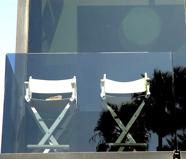 Two chairs on a glass balcony, Ocean Front Walk at Washington Boulevard, Venice Beach
