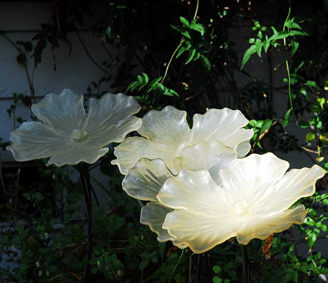 Glass flowers in hidden garden, 55 Rose Avenue in Venice Beach