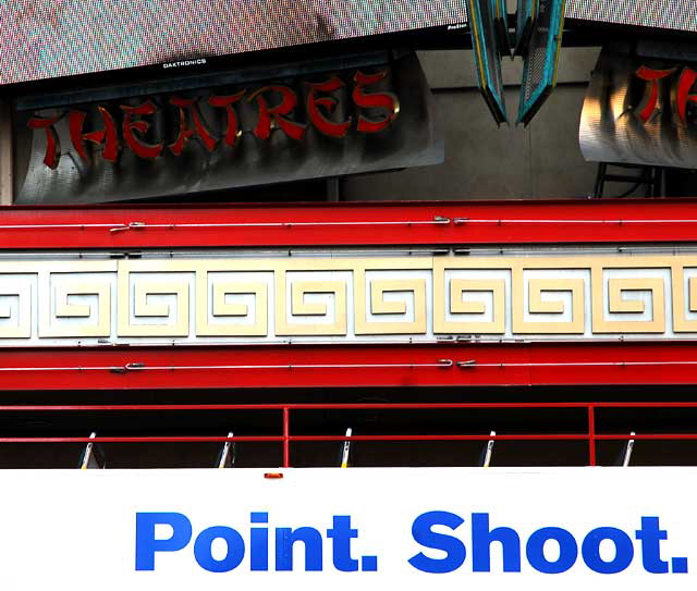 Bank graphic on Hollywood Tour Bus ("Point. Shoot. Deposit.") 