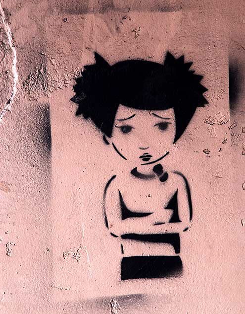 Sad Asian schoolgirl stencil - wall of the former Sonora Café - 180 South La Brea at Third Street