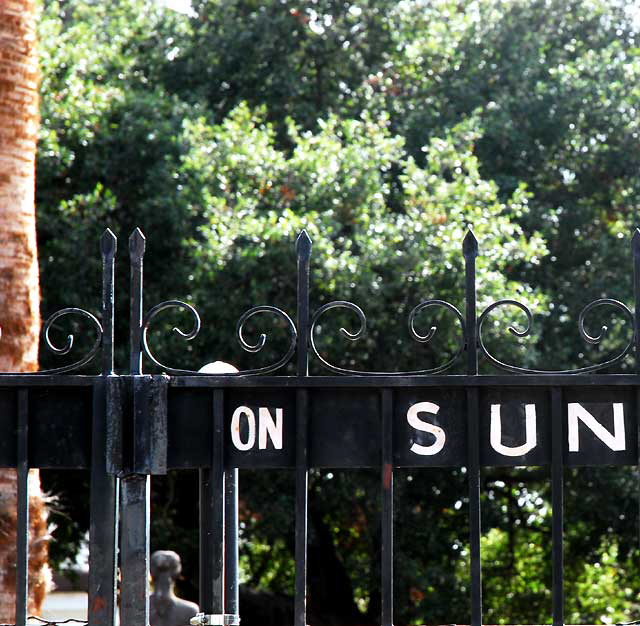 "On Sun" - rear gate at Crossroads of the World, Hollywood