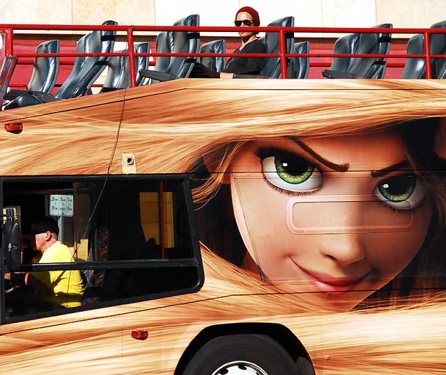 Hollywood tour bus with supergraphic wrap for the Disney film "Twisted"