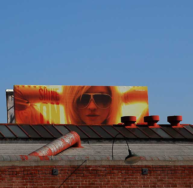 "Shine On" - billboard advertising sunglasses, above 6825 Melrose Avenue