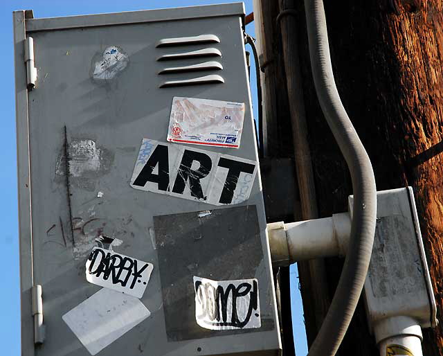 Stickers near the corner of Heliotrope and Melrose, at the edge of the Los Angeles City College campus 