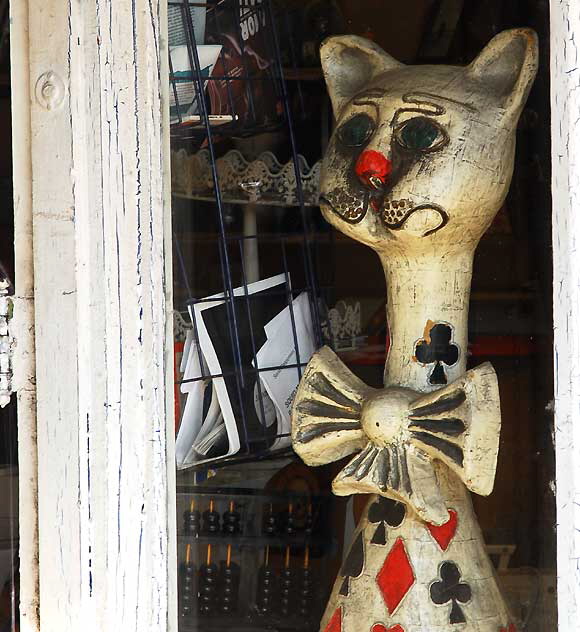 Wooden cat in shop window near Heliotrope and Melrose