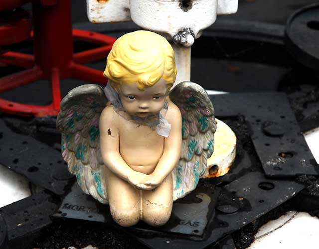 Sad Angel, courtyard of The Crossroads of the World, Sunset Boulevard 