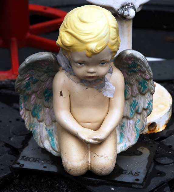 Sad Angel, courtyard of The Crossroads of the World, Sunset Boulevard 