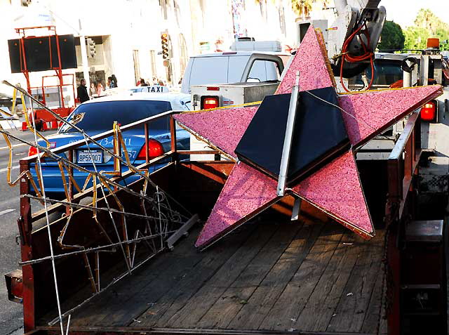 Putting up the Christmas Stars on Hollywood Boulevard