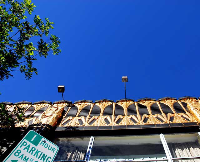 Black and gold terra cotta building at Third Street and Western Avenue, built in 1931 as the Selig Clothing Store, designed by Arthur E. Harvey