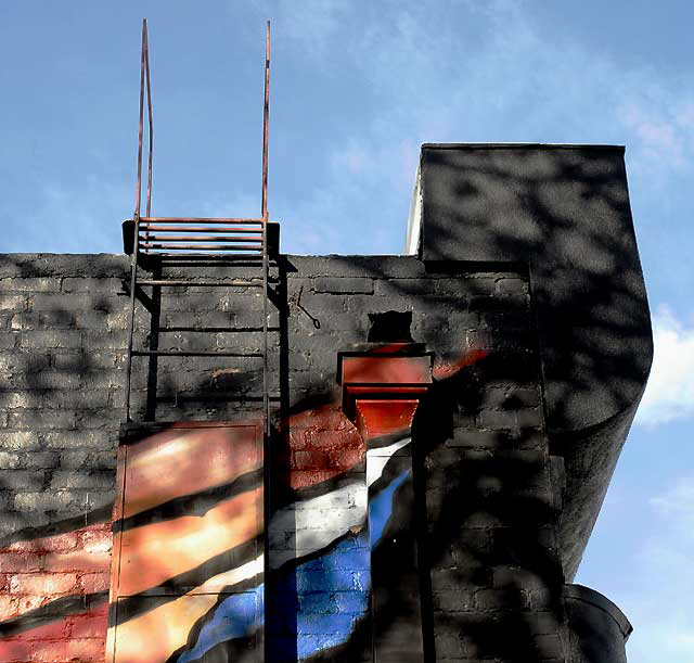 Ladder on graffiti wall, alley behind Melrose Avenue