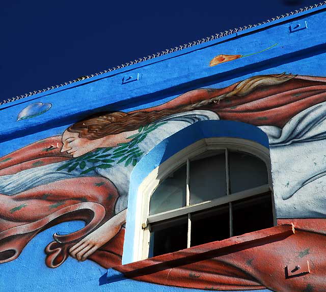 The "History is Myth" mural in Venice Beach, being touched-up on Monday, December 27, 2010 