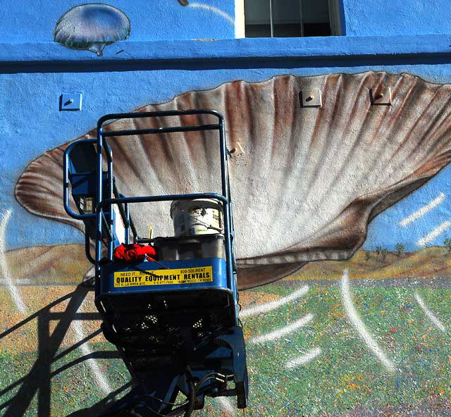 The "History is Myth" mural in Venice Beach, being touched-up on Monday, December 27, 2010 