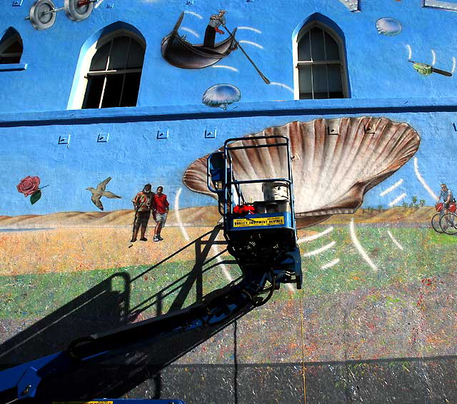 The "History is Myth" mural in Venice Beach, being touched-up on Monday, December 27, 2010 