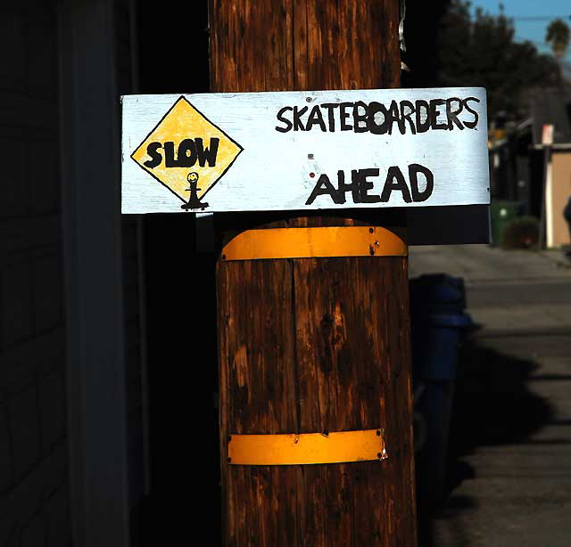 Slow - Skateboarders Ahead