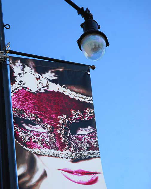 Masked Woman - banner on Hollywood Boulevard