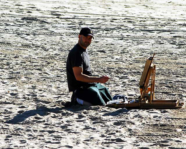 Painter on the beach at the Venice Beach Pier, Wednesday, February 9, 2011