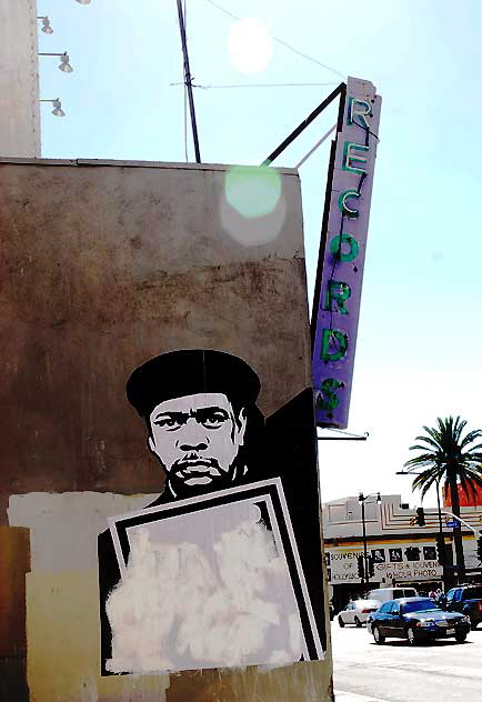 Graphic, Hispanic Man in Beret, Highland Avenue just north of Hollywood Boulevard, Thursday, February 17, 2011