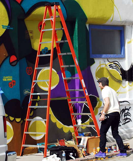 The Belgium-born street artist "Chase" at work at a new mural, Venice Beach, Friday, March 4, 2011