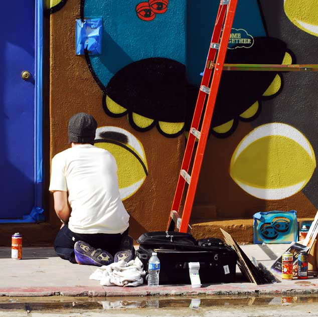 The Belgium-born street artist "Chase" at work at a new mural, Venice Beach, Friday, March 4, 2011