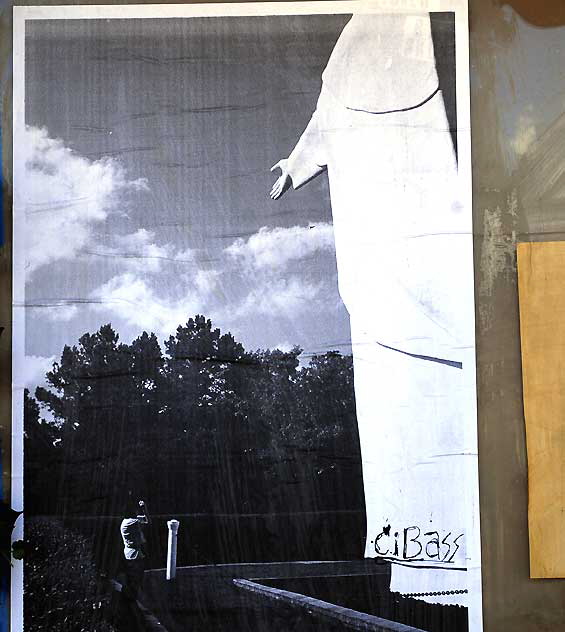 Poster - photo of a man photographing a Christ statue