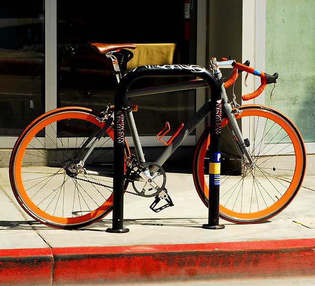 Orange Bicycle, Red Curb