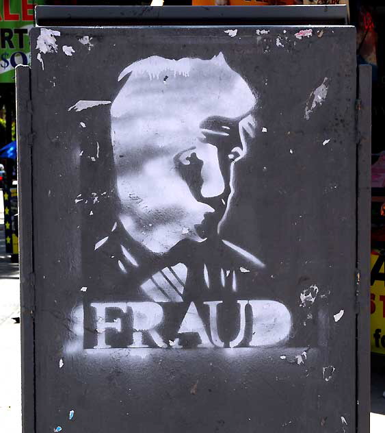 "Fraud" - stencil on utility box, Hollywood Boulevard