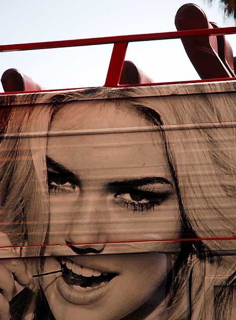 "Guess" supergraphic on Hollywood tour bus, Tuesday, March 22, 2011