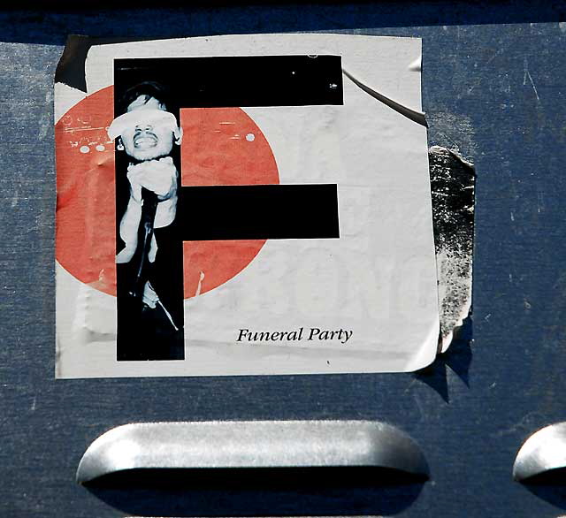 Sticker in the parking lot behind the Viper Room on the Sunset Strip, Friday, April 1, 2011