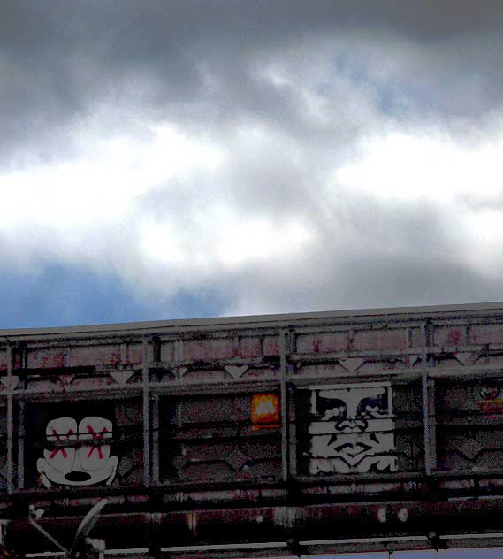Faces on the back side of a billboard, Sunset Boulevard near Gower, Wednesday, April 20, 2011